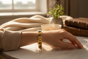 Person wearing 18K gold magnetic therapy bracelet – lifestyle shot